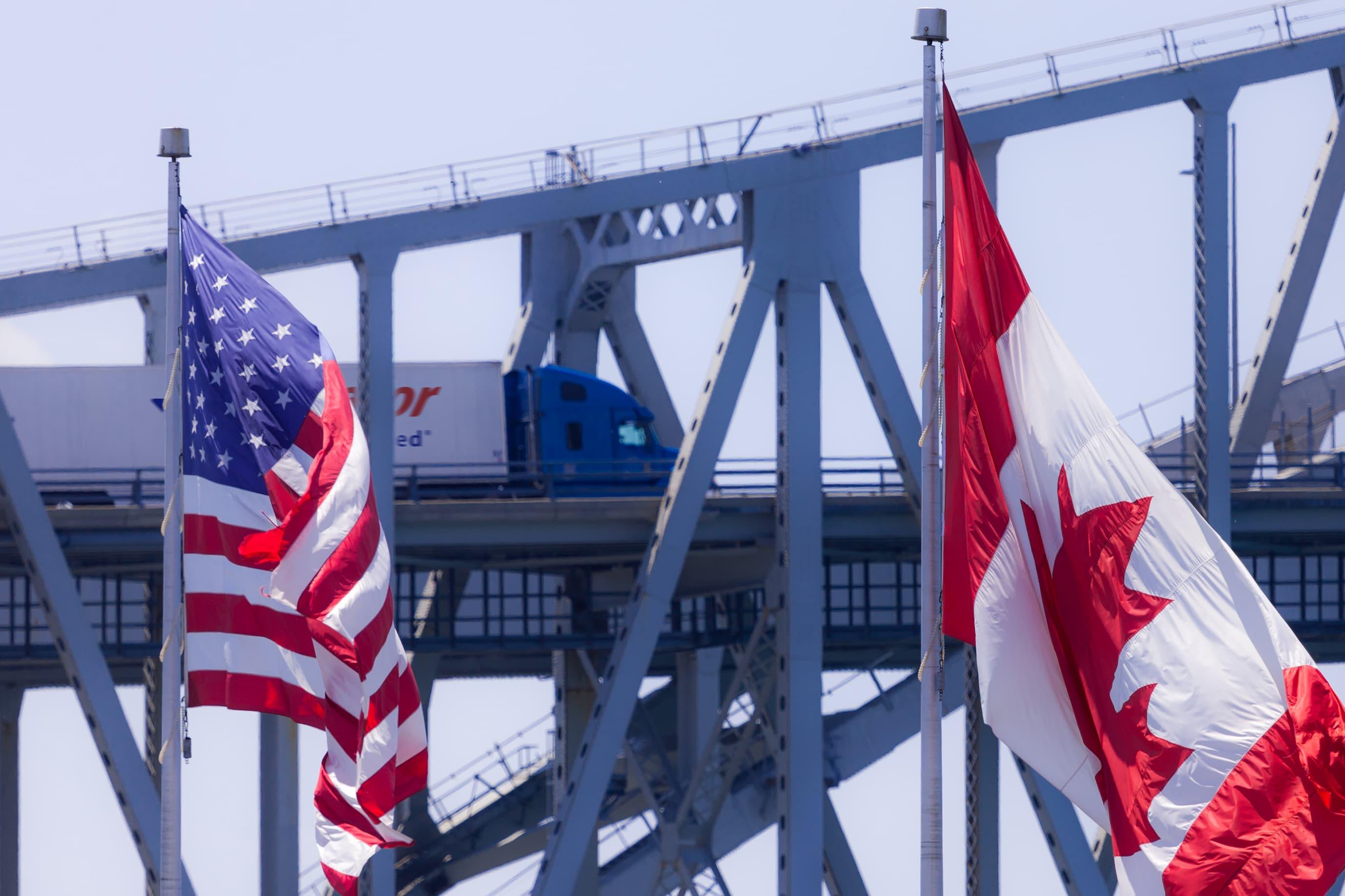 US and Canadian flags